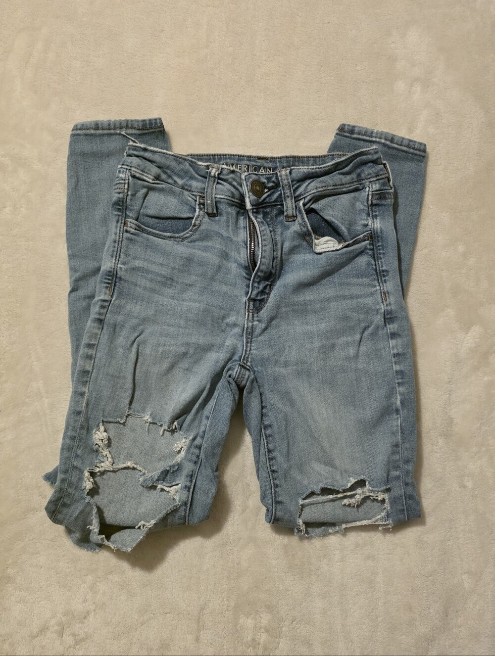 Distressed Medium-Wash Skinny Jeans